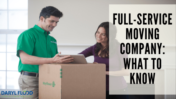 full service moving company employee speaking with woman customer
