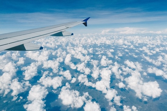 view from a plane with clouds 